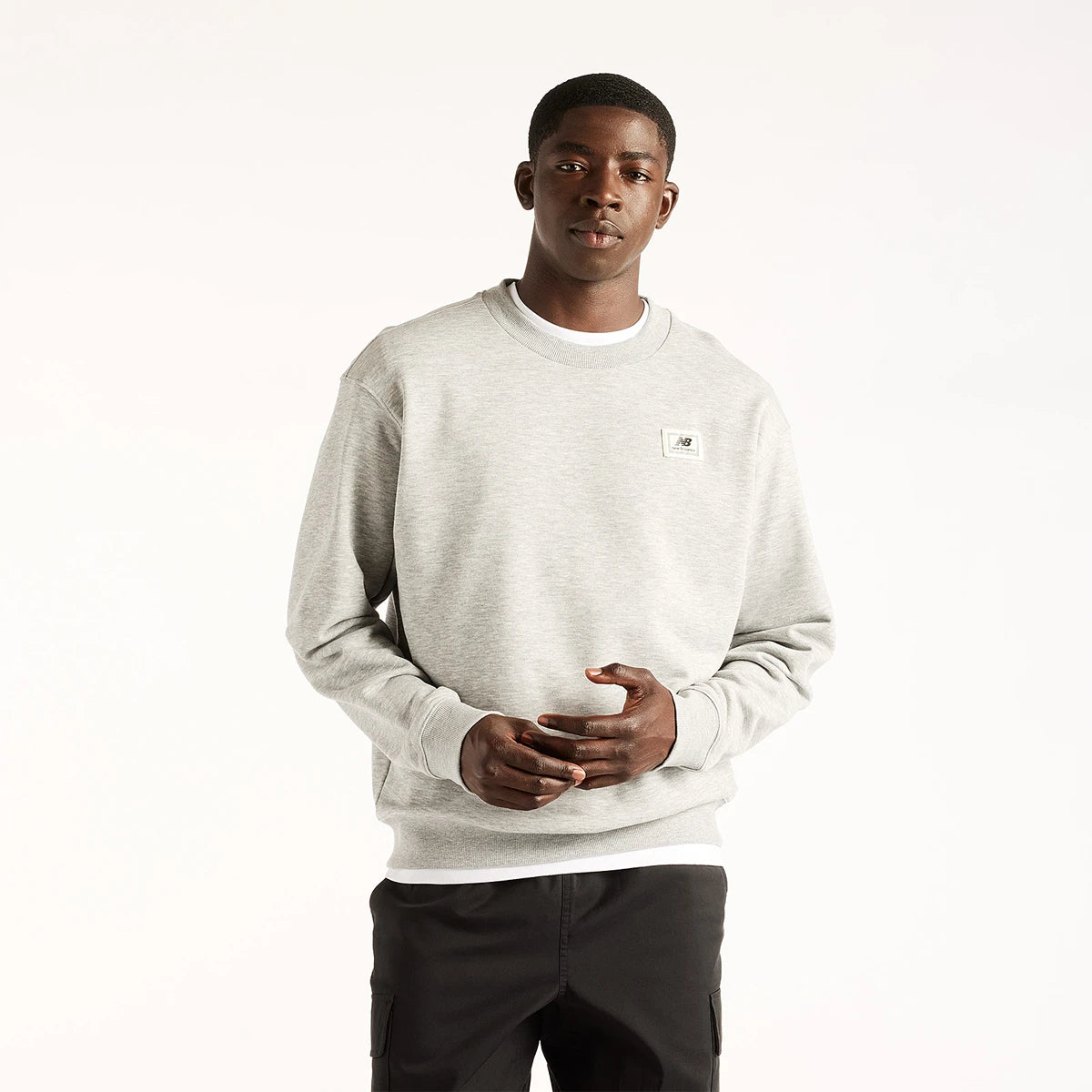 NEW BALANCE WOVEN LABEL SWEAT