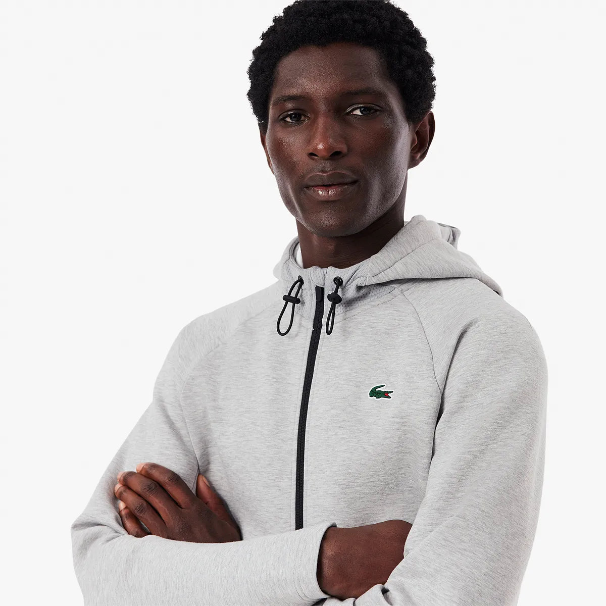 SWEAT LACOSTE CORE PERRFORMANCE A CAPUCHE FZ MESH