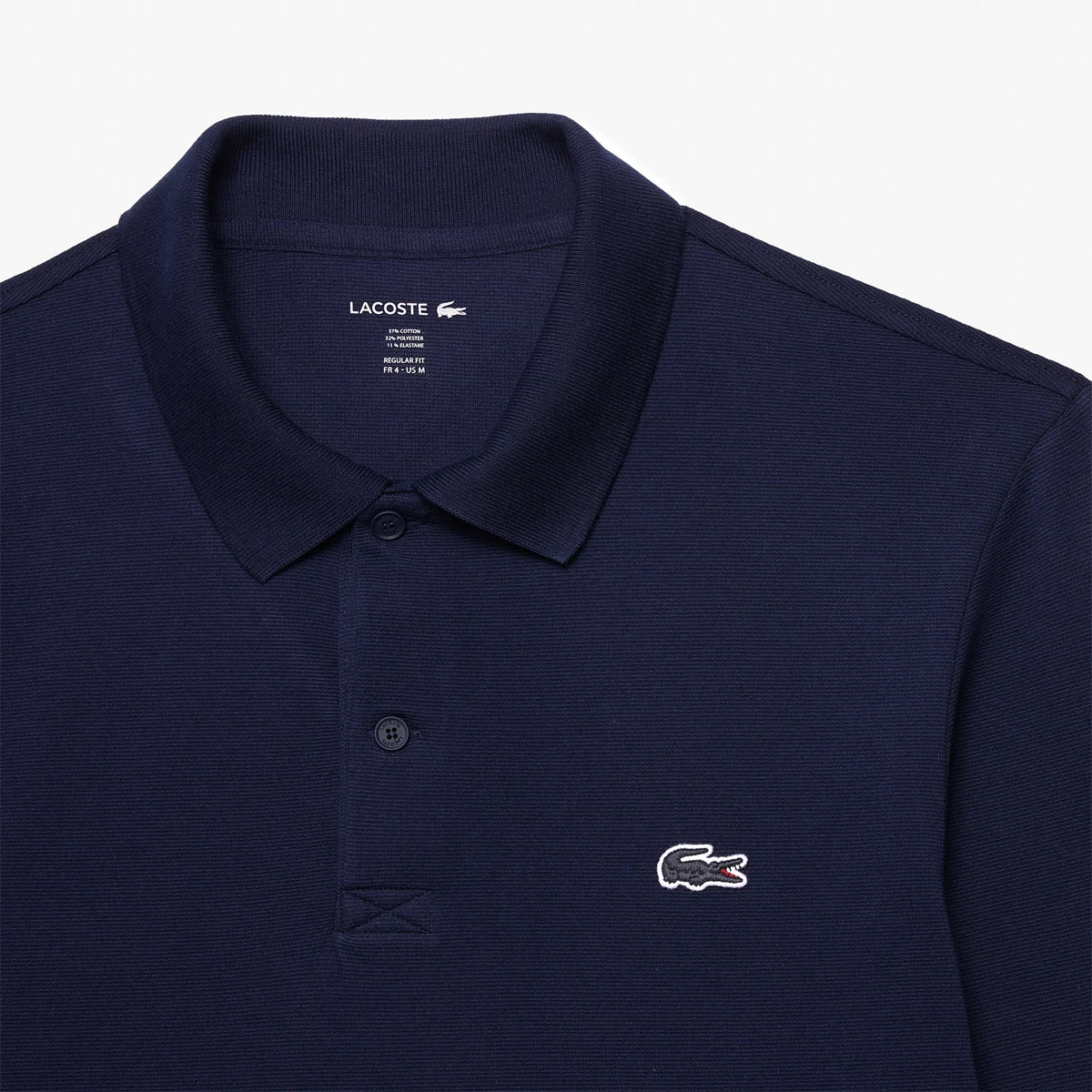 POLO LACOSTE CORE PERFORMANCE MANCHES LONGUES
