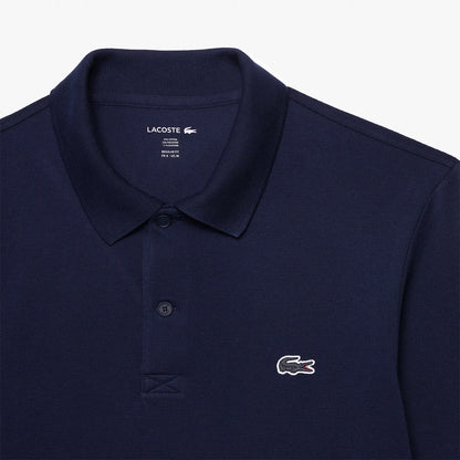 POLO LACOSTE CORE PERFORMANCE MANCHES LONGUES