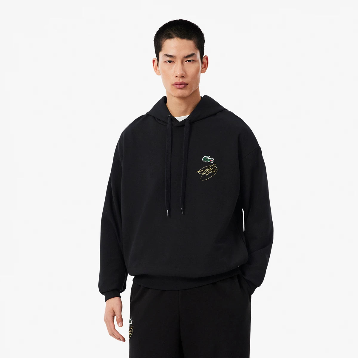 SWEAT A CAPUCHE LACOSTE DJOKOVIC ON COURT