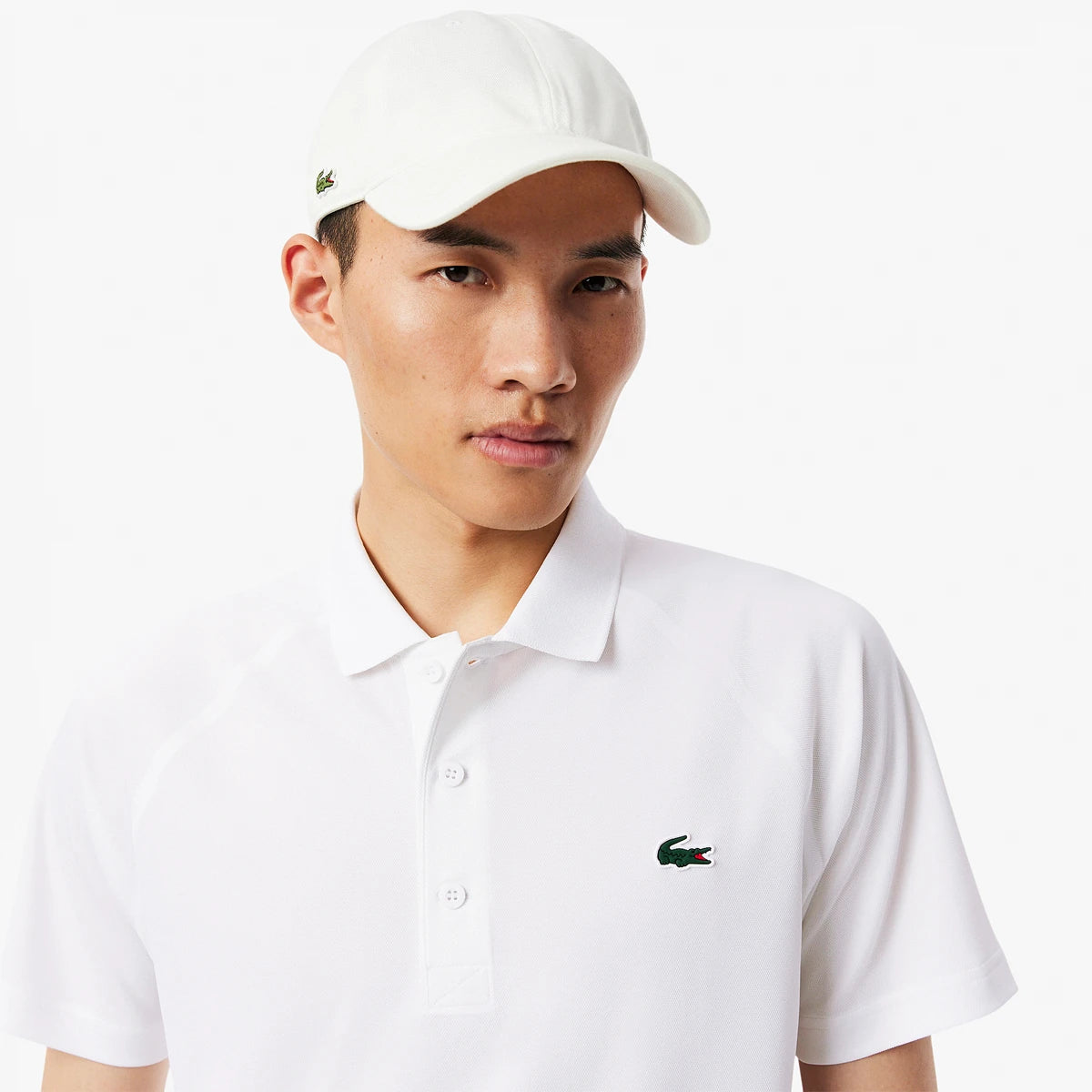 POLO LACOSTE CORE PERFORMANCE SPORT RAGLAN