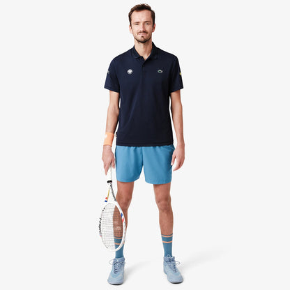 KURZ LACOSTE ROLAND-GARROS SPIELER AUF DEM PLATZ